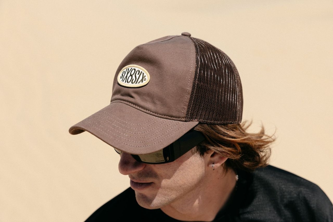 Range — brown canvas mesh-back trucker, sun and shades